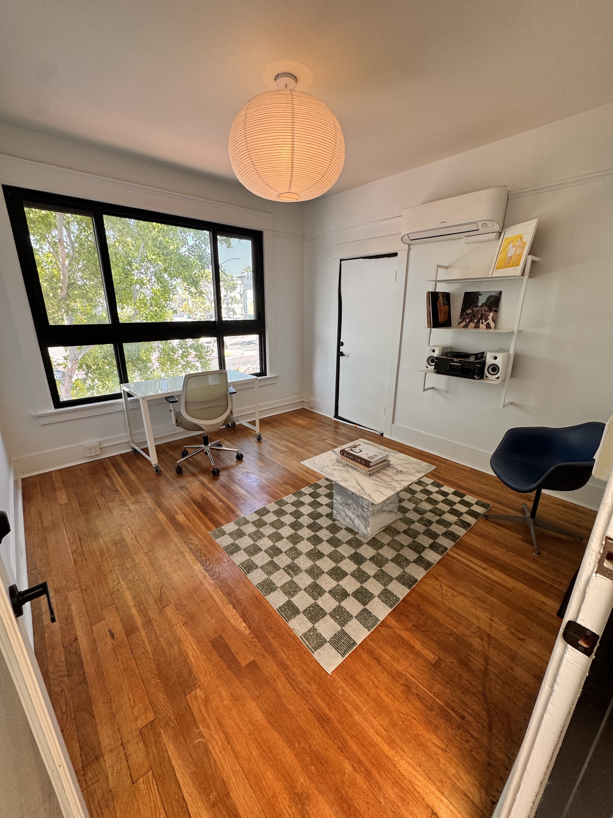 Granada House office space with natural light and street-facing windows